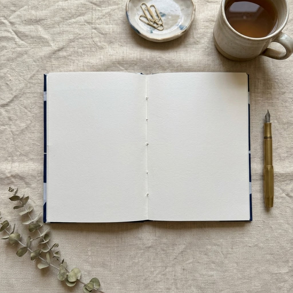 Hand-stitched A5 journal with a hand block printed fabric cover, made in Rajasthan